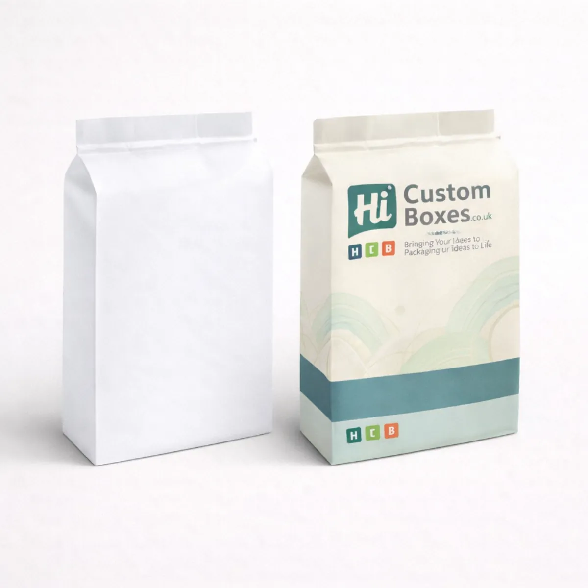 Two paper carrier bags with a folded top- designed for lightweight and eco-friendly bedding packaging- class=